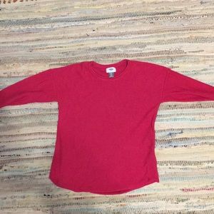 A thin pink old navy sweater